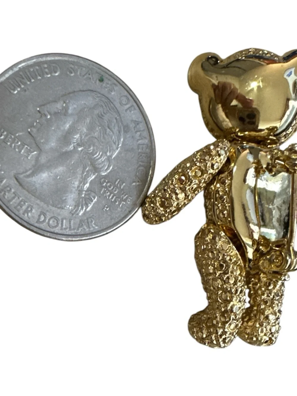 Vintage gold-tone articulated teddy bear brooch highly collectible